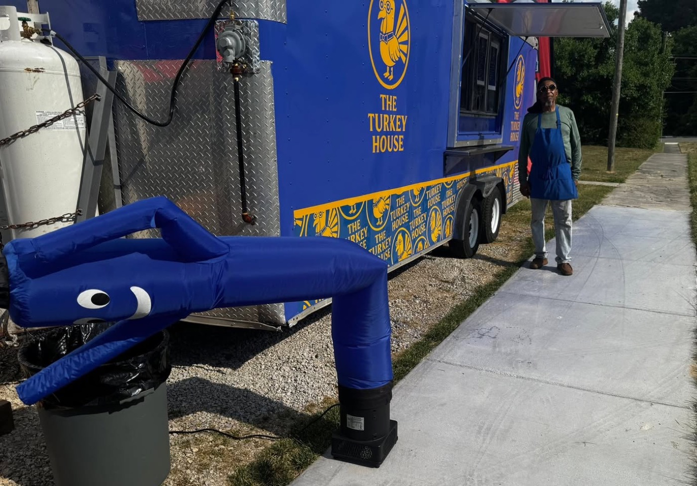 The Turkey House food truck on Burlington Ave with its blue and gold turkey logo